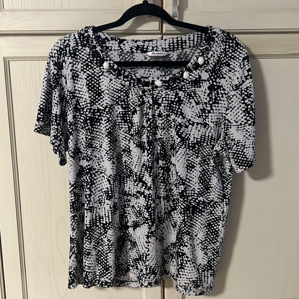 A pretty top by Tanjay in size large